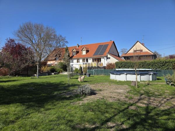 Maison familiale avec grand terrain