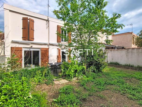 Maison 5 pièces avec jardin et stationnement