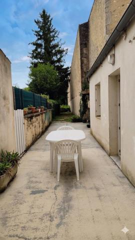 Centre ville, 115 m², grenier, jardin clos