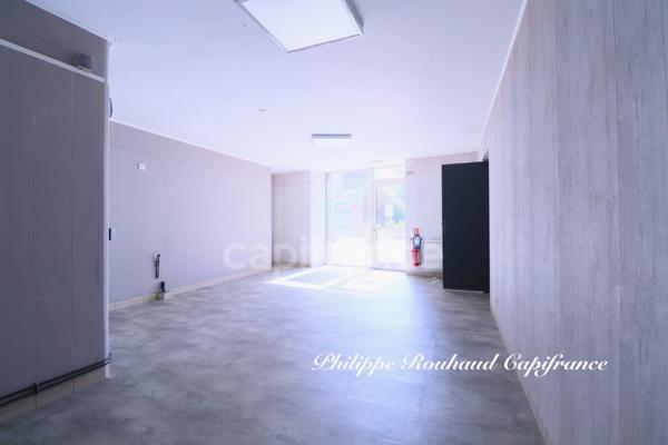 Ensemble Immobilier d'Exception : Commerce et Locatif au Cœur d'une Cité de Caractère (220 m²)