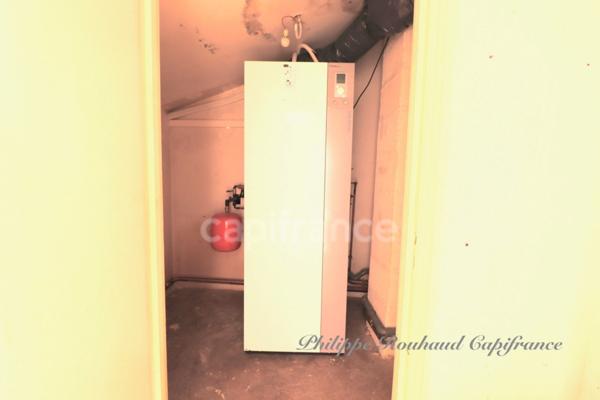 Ensemble Immobilier d'Exception : Commerce et Locatif au Cœur d'une Cité de Caractère (220 m²)