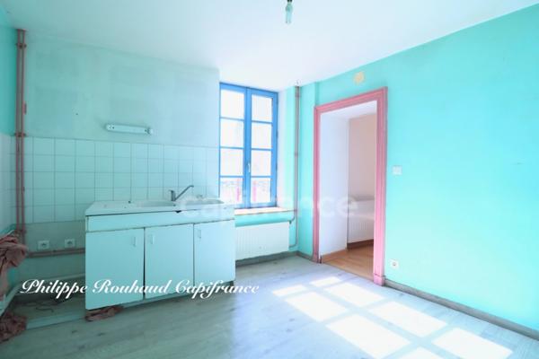 Ensemble Immobilier d'Exception : Commerce et Locatif au Cœur d'une Cité de Caractère (220 m²)