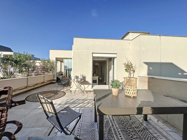 Appartement T4 en rooftop de 103m² avec terrasse, box à Lyon