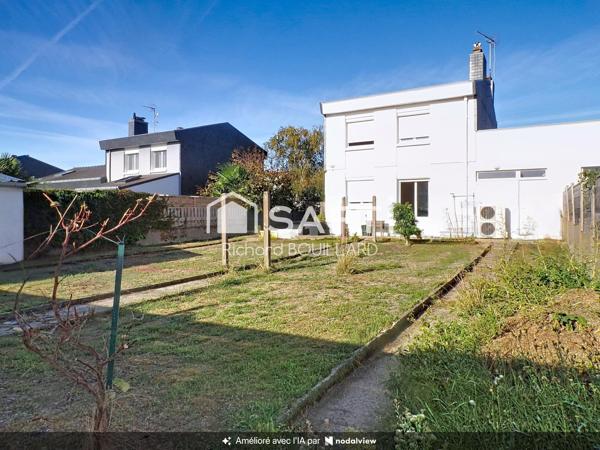 Maison familiale avec jardin au calme à Donges centre