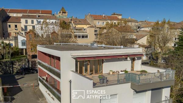 Grand appartement traversant avec belle terrasse , vue dominante et garage , centre ville