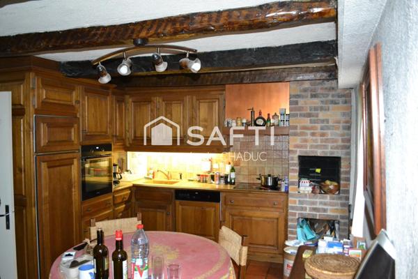 Immeuble 415 m2 avec local commercial libre