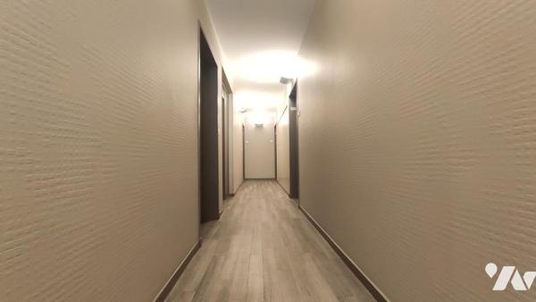 Appartement T2 de 46 m² avec balcon, cave et place de parking.