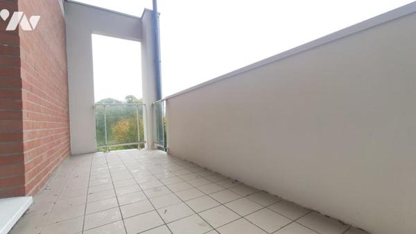 Appartement T2 de 46 m² avec balcon, cave et place de parking.