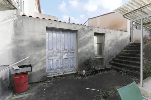 IMMEUBLE 600 m2  avec 6 appartements, un garage, un  jardinet et  3 dépendances  MAZAMET