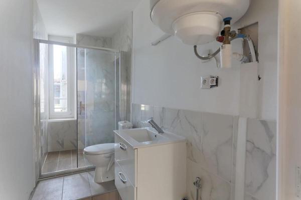 IMMEUBLE 600 m2  avec 6 appartements, un garage, un  jardinet et  3 dépendances  MAZAMET