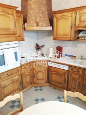 Très jolie maison individuelle d'une surface habitable de 126 m2  divisée en deux appartements sur terrain attenant