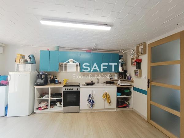 Très jolie maison individuelle d'une surface habitable de 126 m2  divisée en deux appartements sur terrain attenant