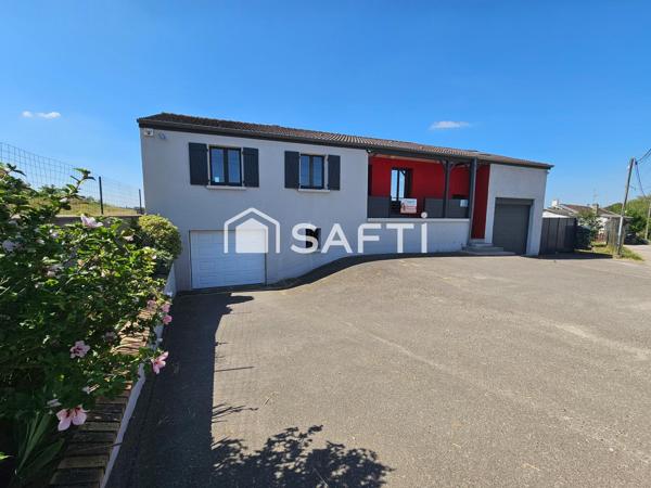 Maison individuelle - 4 chambres - sous-sol - garages - carport - jardin et superbe vue!