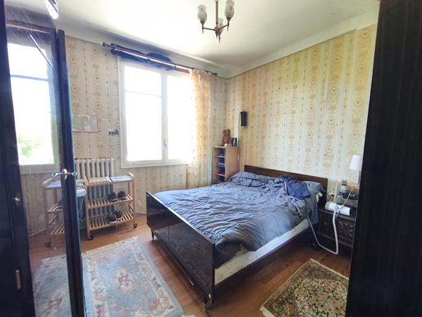 Maison avec garage et jardin