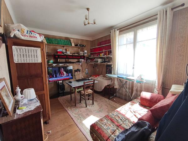 Maison avec garage et jardin