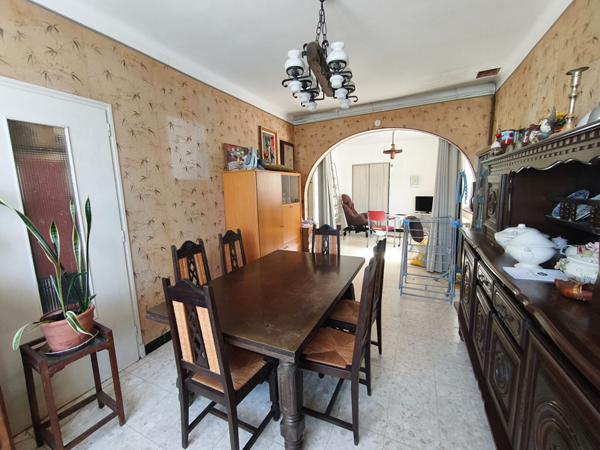 Maison avec garage et jardin