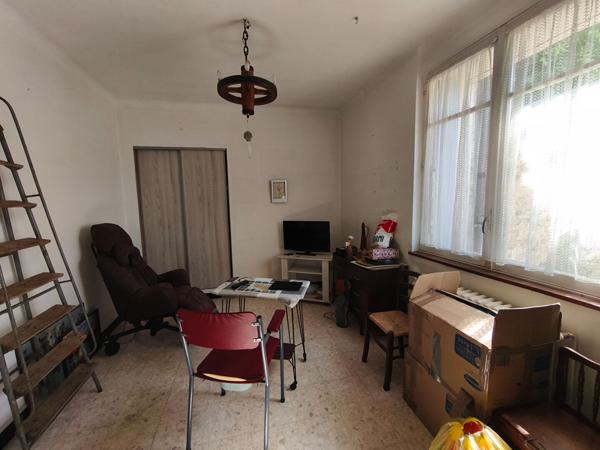 Maison avec garage et jardin