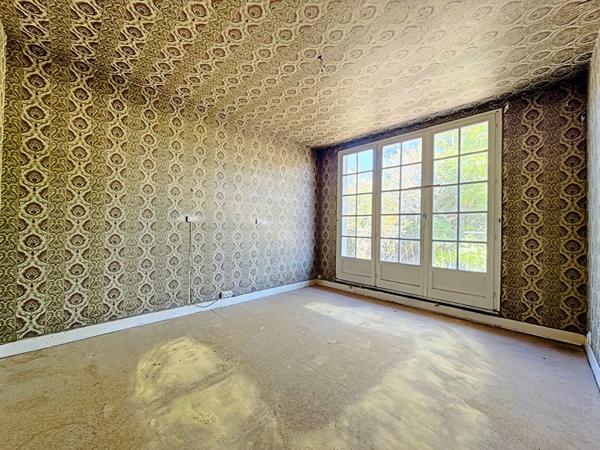 Maison spacieuse 7 pièces à rénover à Reims, idéalement située avec grand jardin