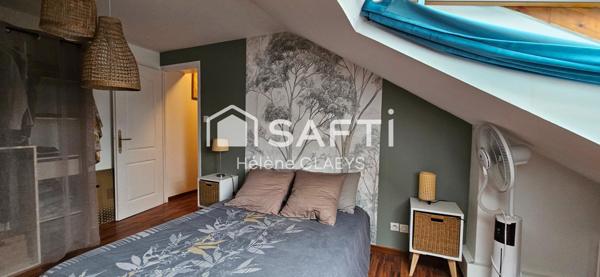 Apparemment en duplex 2 chambres salle de bains cuisine aménagée et équipée 1 place de parking