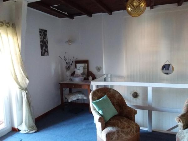 Maison de village à vendre 4 pièces proche de TARBES (65) avec parking et jardin.