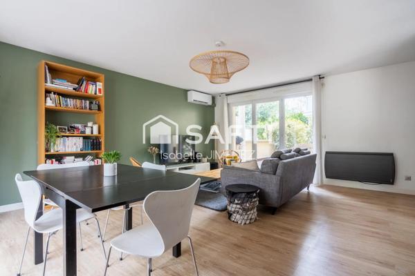 Appartement en parfait état avec jardin et terrasses et box