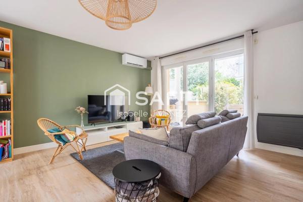 Appartement en parfait état avec jardin et terrasses et box