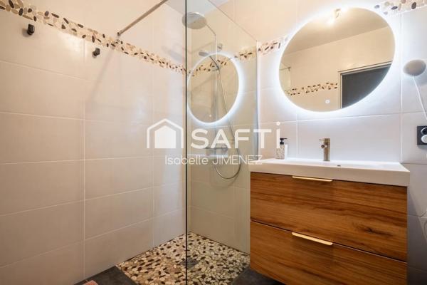 Appartement en parfait état avec jardin et terrasses et box