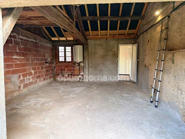 Maison- 3 pièces avec jardin et grand garage