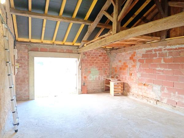 Maison- 3 pièces avec jardin et grand garage