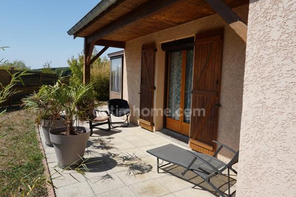 Maison à vendre avec 4 chambres, véranda et garage double à 8 km de Rioz