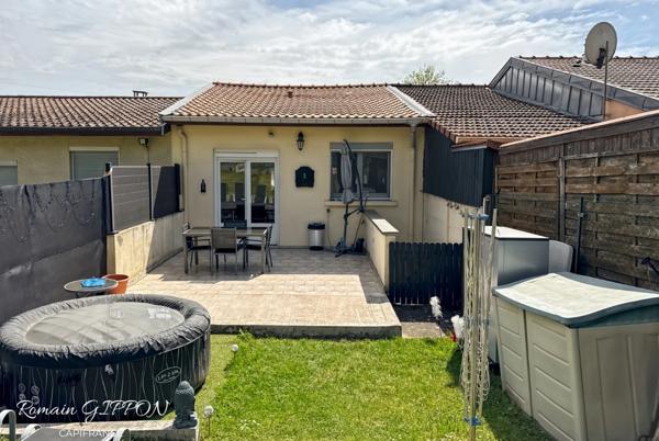 Maison 4 pièces de 103 m² rénovée avec jardin, terrasse, garage et vue dégagée sur la nature à Liverdun