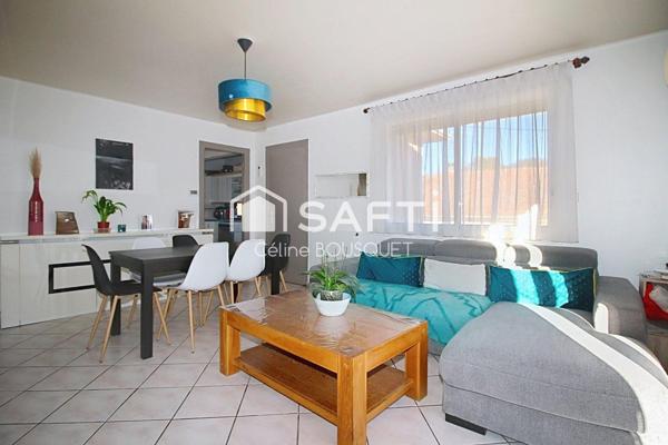 Appartement P4 de 66 m2 avec cours, garage et caves