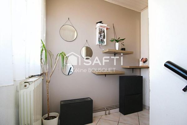 Appartement P4 de 66 m2 avec cours, garage et caves