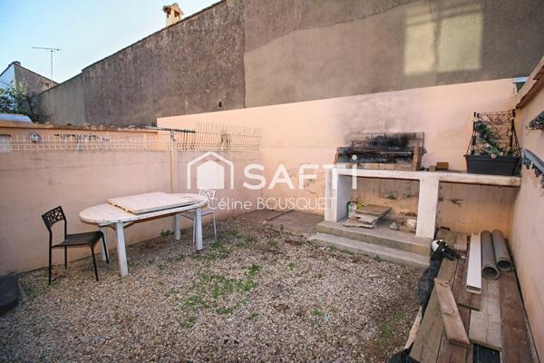Appartement P4 de 66 m2 avec cours, garage et caves