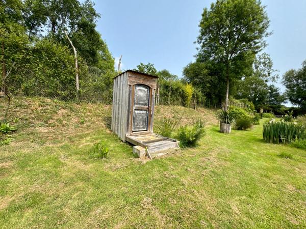 Terrain de loisirs de 4100m2 avec étang et bâtiment
