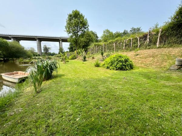 Terrain de loisirs de 4100m2 avec étang et bâtiment