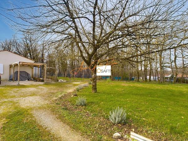 Maison et grand terrain constructble