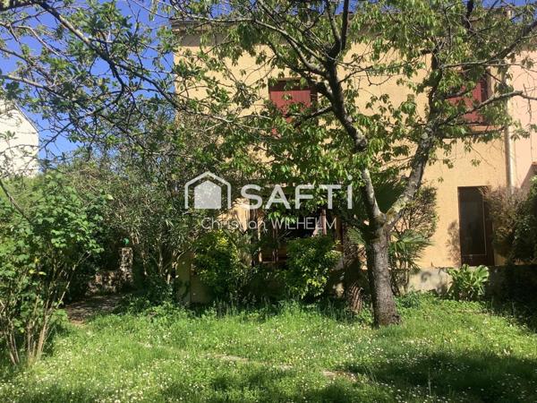 Maison avec garage sur parcelle de 369m2 clos