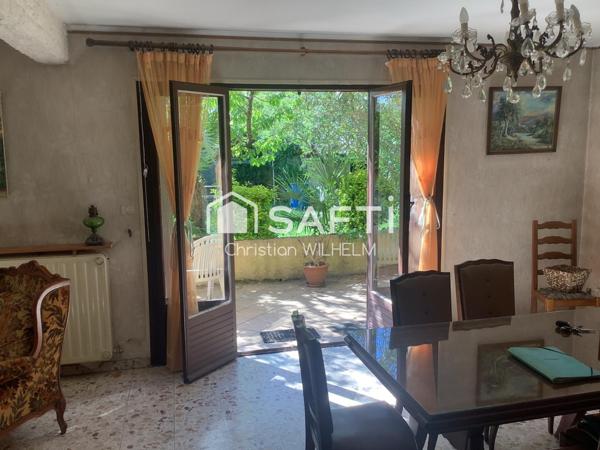 Maison avec garage sur parcelle de 369m2 clos