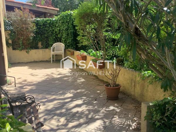 Maison avec garage sur parcelle de 369m2 clos