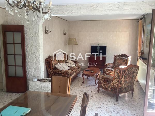 Maison avec garage sur parcelle de 369m2 clos