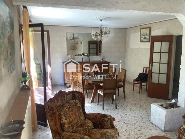 Maison avec garage sur parcelle de 369m2 clos
