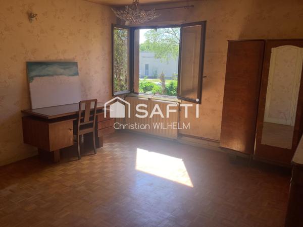 Maison avec garage sur parcelle de 369m2 clos