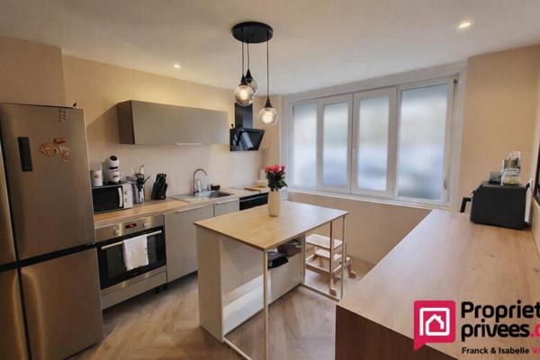 Maison  rénovée - 3 chambres - jardin - places de parking - 95m² (115 utiles)