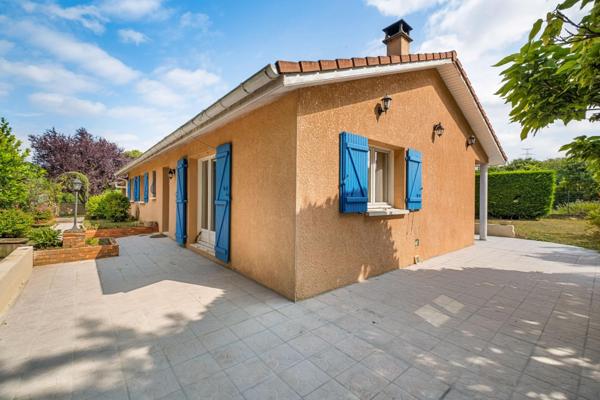 Maison de plain-pied avec jardin