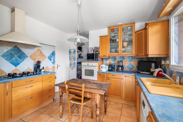 Maison de plain-pied avec jardin