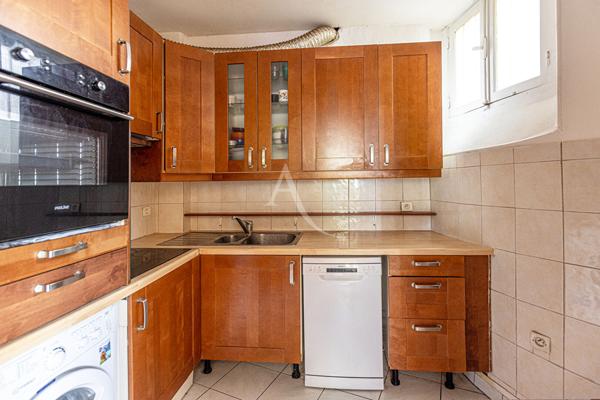 Appartement Paris 4 pièce(s) 61.48 m2