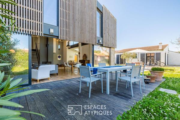 Ancien hangar sublimé en loft d’exception avec jardin intimiste