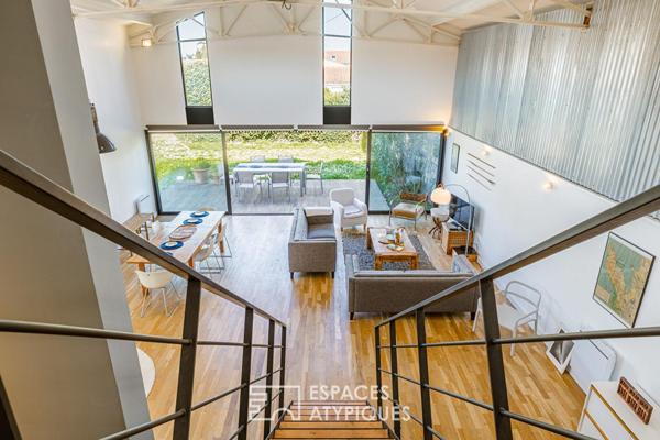 Ancien hangar sublimé en loft d’exception avec jardin intimiste