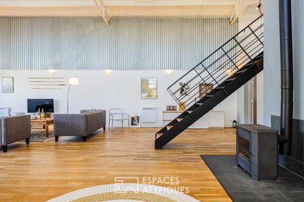 Ancien hangar sublimé en loft d’exception avec jardin intimiste